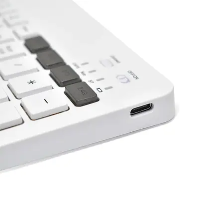 Vista lateral de Teclado Nisuta Inalambrico + Bluetooth Compacto Espanol Blanco Recargable